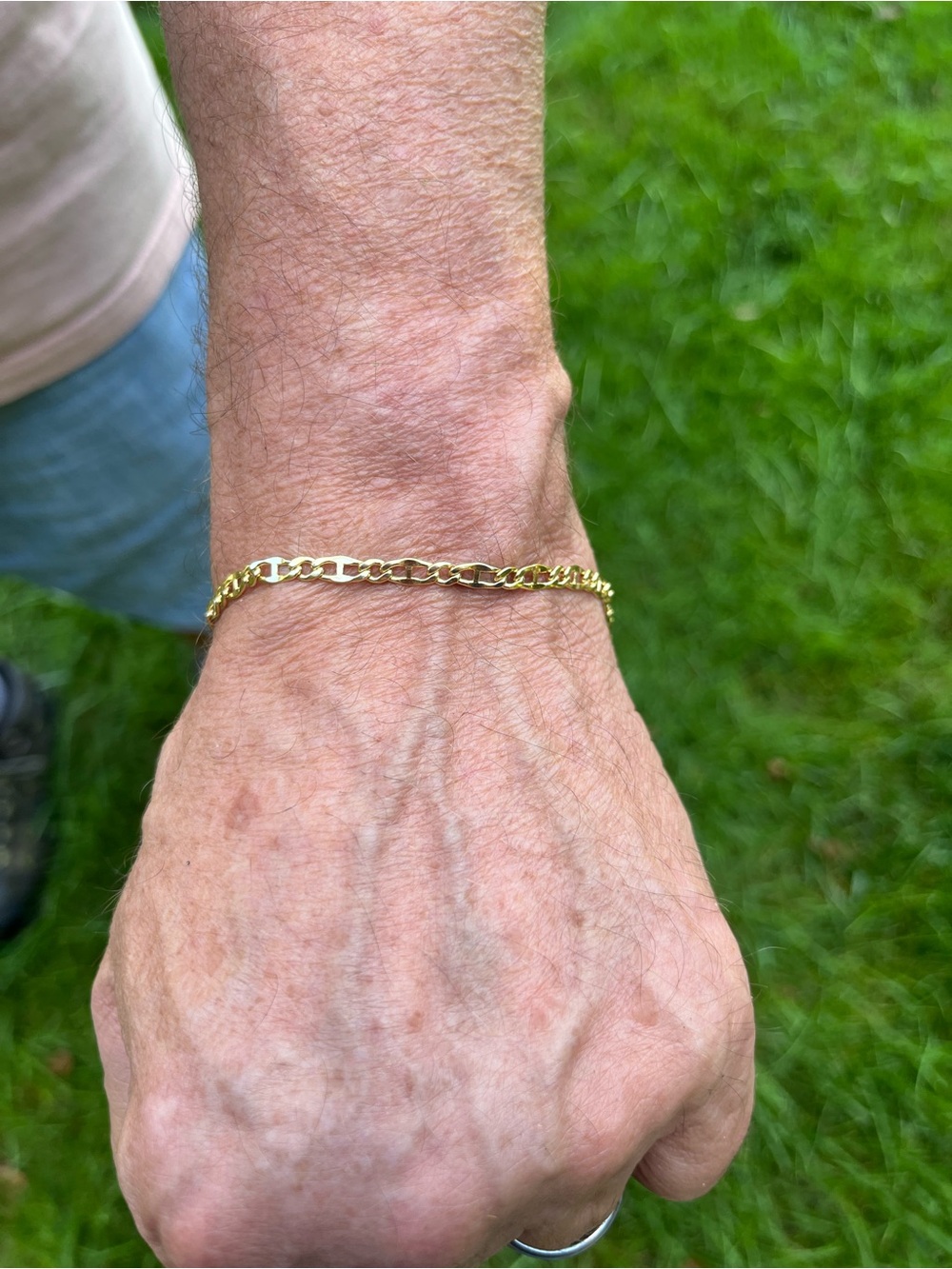 18ky solid men’s 8” bracelet purchased in Italy. New, never worn.